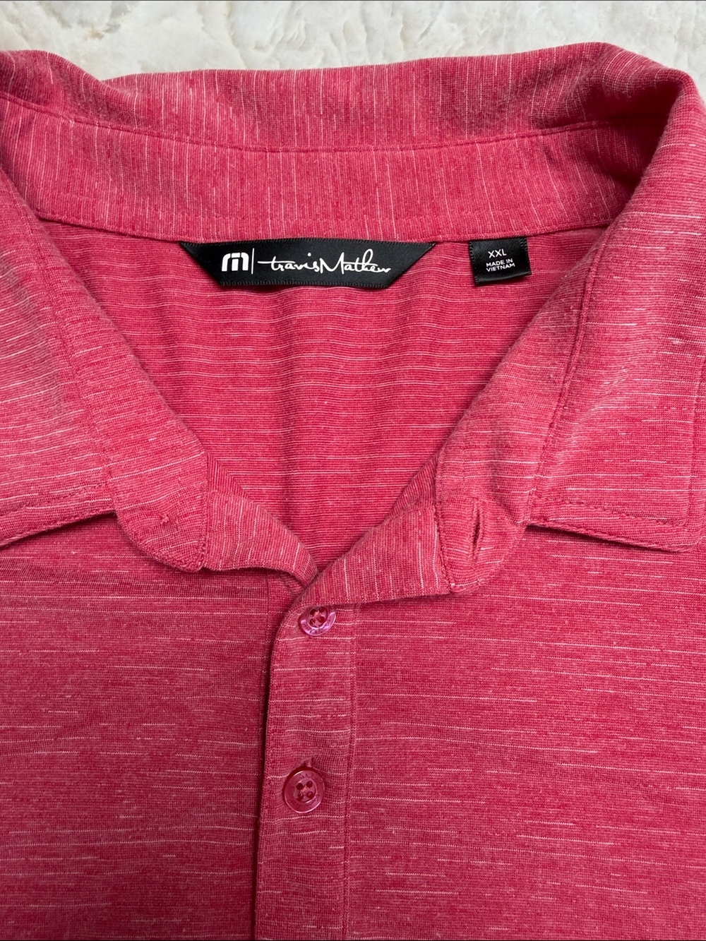 Travis Mathew Men's Heathered Raspberry Polo - Picture 2 of 5